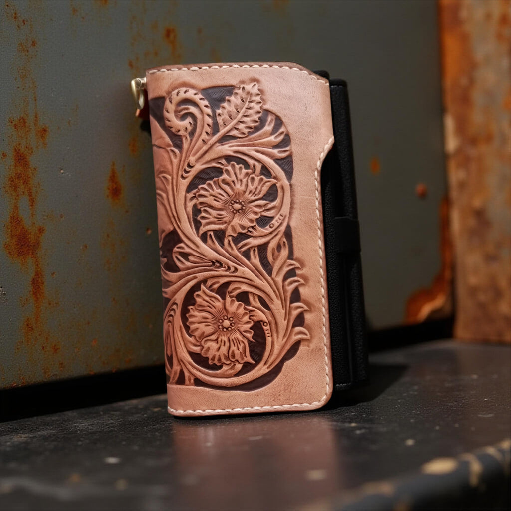 Back brown leather wallet with skull design and turquoise stone on a textured surface